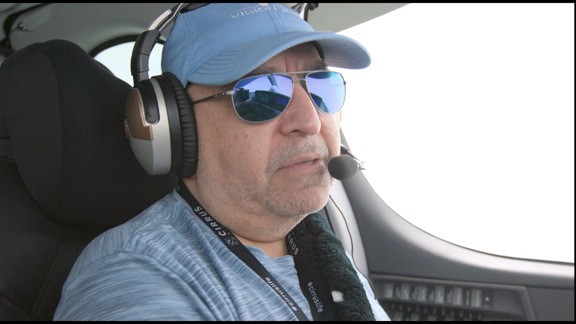 Kamal in a light-aircraft cockpit